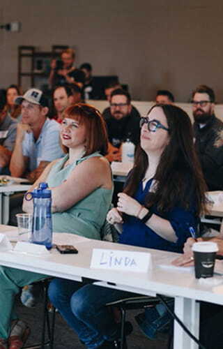 A Swell paid media team reviewing campaign performance and pipeline together