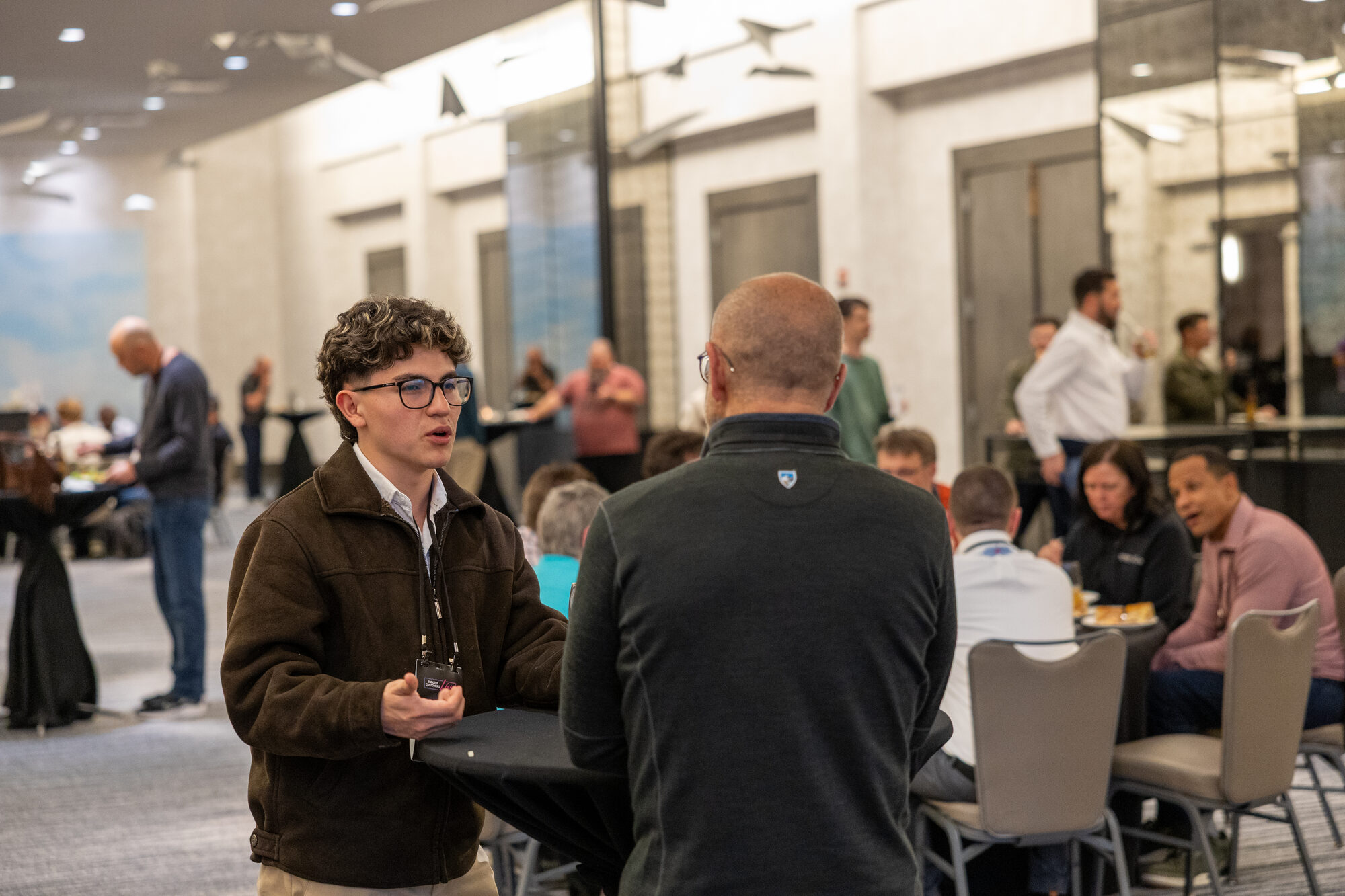 Attendees networking between sessions
