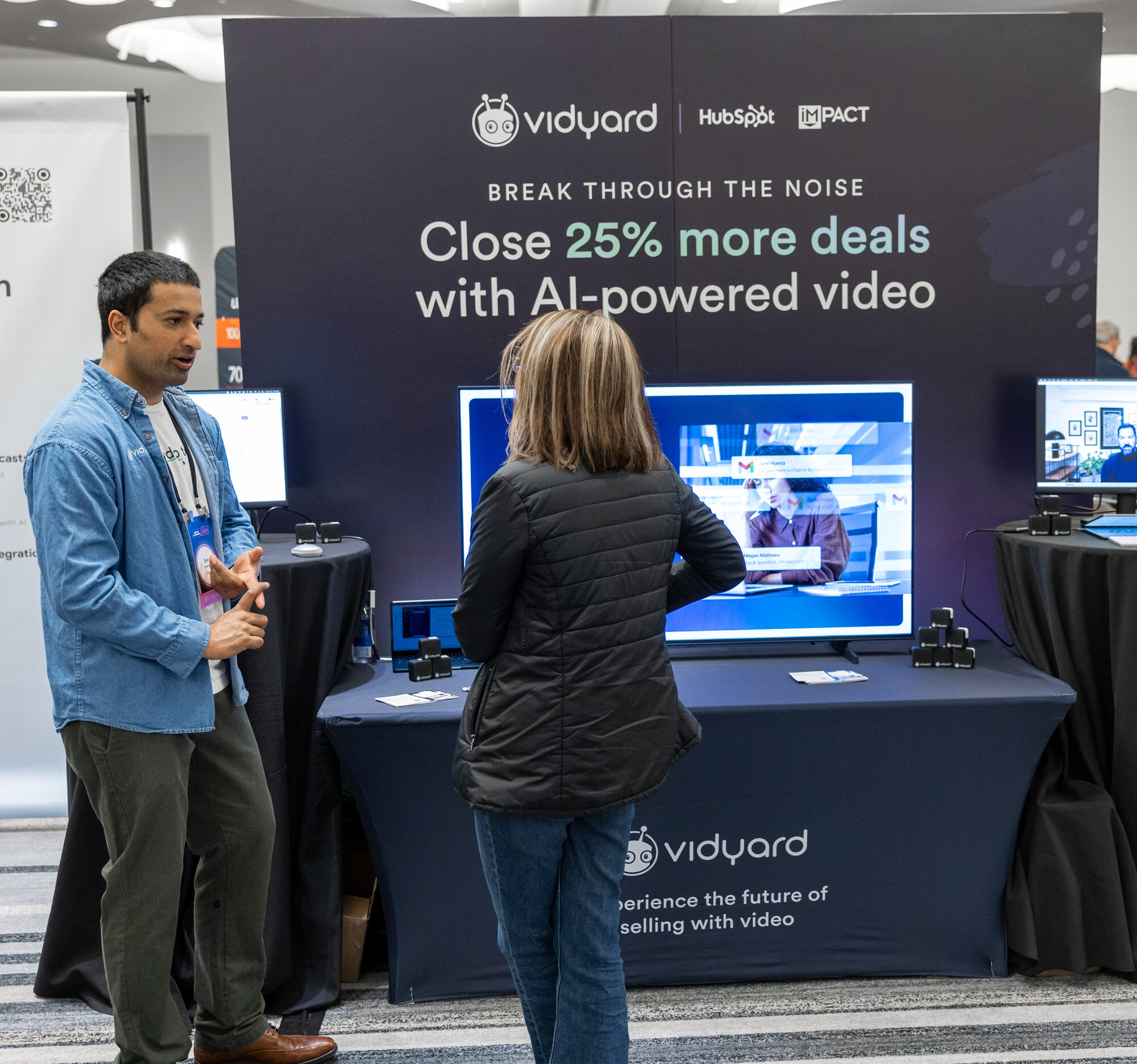 Conversations at a sponsor booth